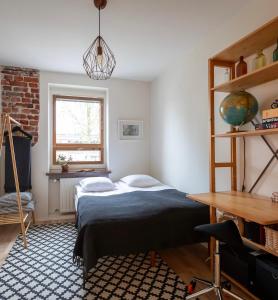 Ένα ή περισσότερα κρεβάτια σε δωμάτιο στο Tilava saunallinen kolmio