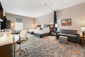 Posezení v ubytování Home2 Suites Pensacola I-10 At North Davis Hwy