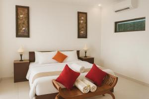 Postel nebo postele na pokoji v ubytování Villa Belharra