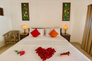 Postel nebo postele na pokoji v ubytování Villa Belharra