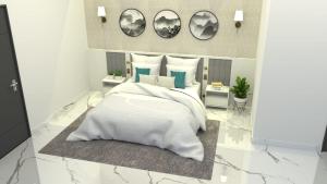 a rendering of a bedroom with a white bed and pillows at S by Z Hotels, HSR in Bengaluru