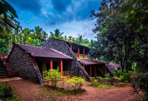 Zahrada ubytování Dandeli Vacation + 15 fotografií