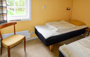 Ένα ή περισσότερα κρεβάτια σε δωμάτιο στο 2 Bedroom Awesome Home In Ekshärad