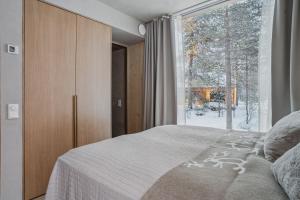 Postel nebo postele na pokoji v ubytování Inai Haven