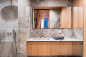 Koupelna v ubytování Inai Haven + 40 fotografií