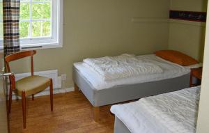 Ένα ή περισσότερα κρεβάτια σε δωμάτιο στο 2 Bedroom Stunning Home In Ekshärad