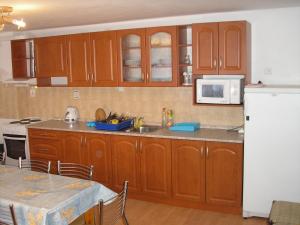 Kuchyň nebo kuchyňský kout v ubytování Modrý dom