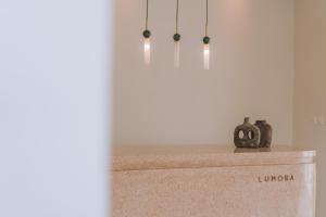 a table with a pumpkin sitting on top of it at Lumora Boutique Villas in Gili Trawangan
