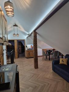 Kuchyň nebo kuchyňský kout v ubytování Apartamenty 61