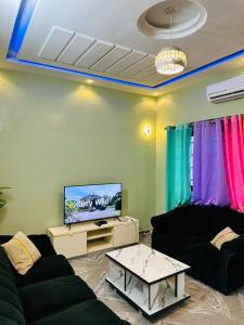 Et tv og/eller underholdning på SEPA SAJ Appartemnt + 13 billeder