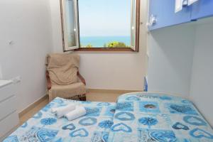 Кровать или кровати в номере Appartamento Arancio