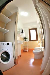 Кровать или кровати в номере Appartamento Arancio