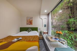 Giường trong phòng chung tại 尚品原宿海景 厦门大学双子塔店