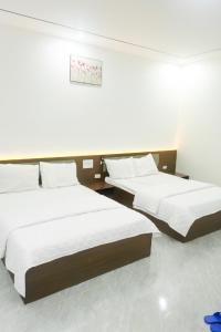 Postel nebo postele na pokoji v ubytování Visip 2 Hotel