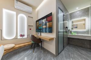 TV/trung tâm giải trí tại 尚品原宿海景 厦门大学双子塔店 +122 ảnh