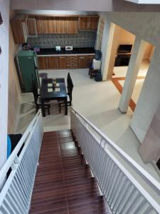 a view from the second floor of a house at Villa Kusuma Pinus M10 in Batu