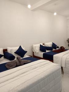 Postel nebo postele na pokoji v ubytování Camellia Inn