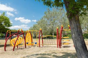 Ο χώρος παιχνιδιού για παιδιά στο Ferienpark Cesenatico Mobilehome Ven für 5 Personen