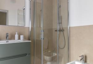 a shower with a glass door in a bathroom at Maison 161 in Rieti +58 photos