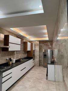 Køkken eller tekøkken på NTHC Estates Adjiringanor East Legon