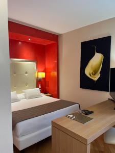 Giường trong phòng chung tại Hotel Europa