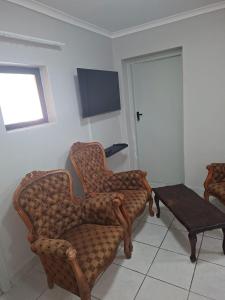 TV a/nebo společenská místnost v ubytování Grace Villas 1 + 12 fotografií