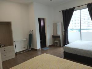 En eller flere senge i et værelse på Premium Garden Home 17 Golden Hills