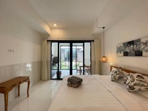 Giường trong phòng chung tại Gede Awan Guesthouse