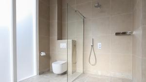 Ένα μπάνιο στο Dam Residence