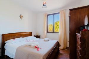 Postel nebo postele na pokoji v ubytování Villa Dolce Vita by Vivimy