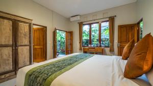 En eller flere senge i et værelse på Khandra Kutuh + 143 billeder