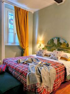 Giường trong phòng chung tại Il Sonetto - Boutique Apartment Suite - Breakfast