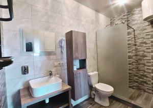 Koupelna v ubytování Український тенісний центр Viccourt + 22 fotografií