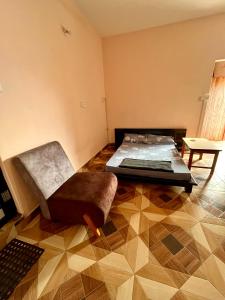 Postel nebo postele na pokoji v ubytování Amelie Apartments and Stay Inn