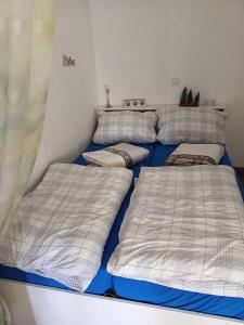 Ένα ή περισσότερα κρεβάτια σε δωμάτιο στο Spitzenkemenate