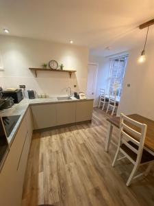 Kuchyň nebo kuchyňský kout v ubytování Brylach Steading