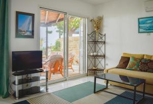 TV/trung tâm giải trí tại Villa Margo by the Sea