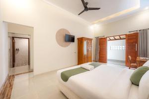 Giường trong phòng chung tại Cove Cubang Homestay