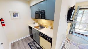 Køkken eller tekøkken på Club Villas Unit 4A + 14 billeder