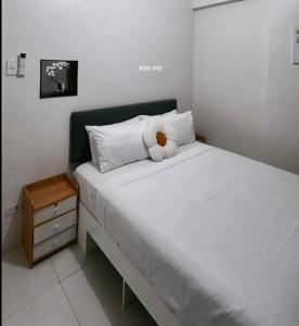 Postel nebo postele na pokoji v ubytování Naga City River View 1BR U1 Apartment