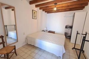 En eller flere senge i et værelse på L'Echo des étangs