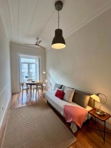 Postel nebo postele na pokoji v ubytování Lisbon Story Guesthouse