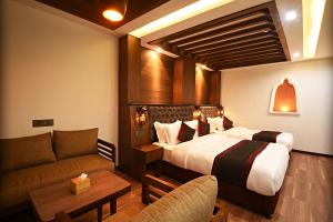 Postel nebo postele na pokoji v ubytování Nepal Paradise Home Pvt Ltd