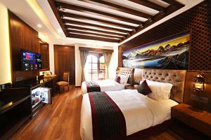 TV a/nebo společenská místnost v ubytování Nepal Paradise Home Pvt Ltd