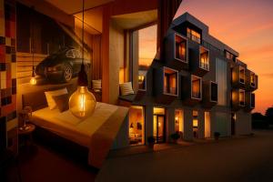 Postel nebo postele na pokoji v ubytování elferrooms Hotel