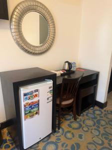 Kuchyň nebo kuchyňský kout v ubytování Saif Al Majd Hotel