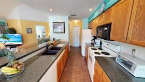 Køkken eller tekøkken på Club Villas Unit 8C