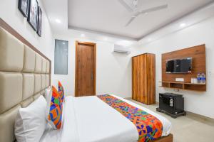 TV a/nebo společenská místnost v ubytování FabHotel Evergreen