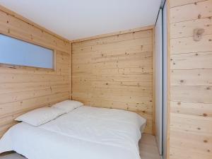 En eller flere senge i et værelse på Enchaple S61