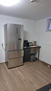 Una cocina o cocineta en Ferienhaus an der Thyragrotte